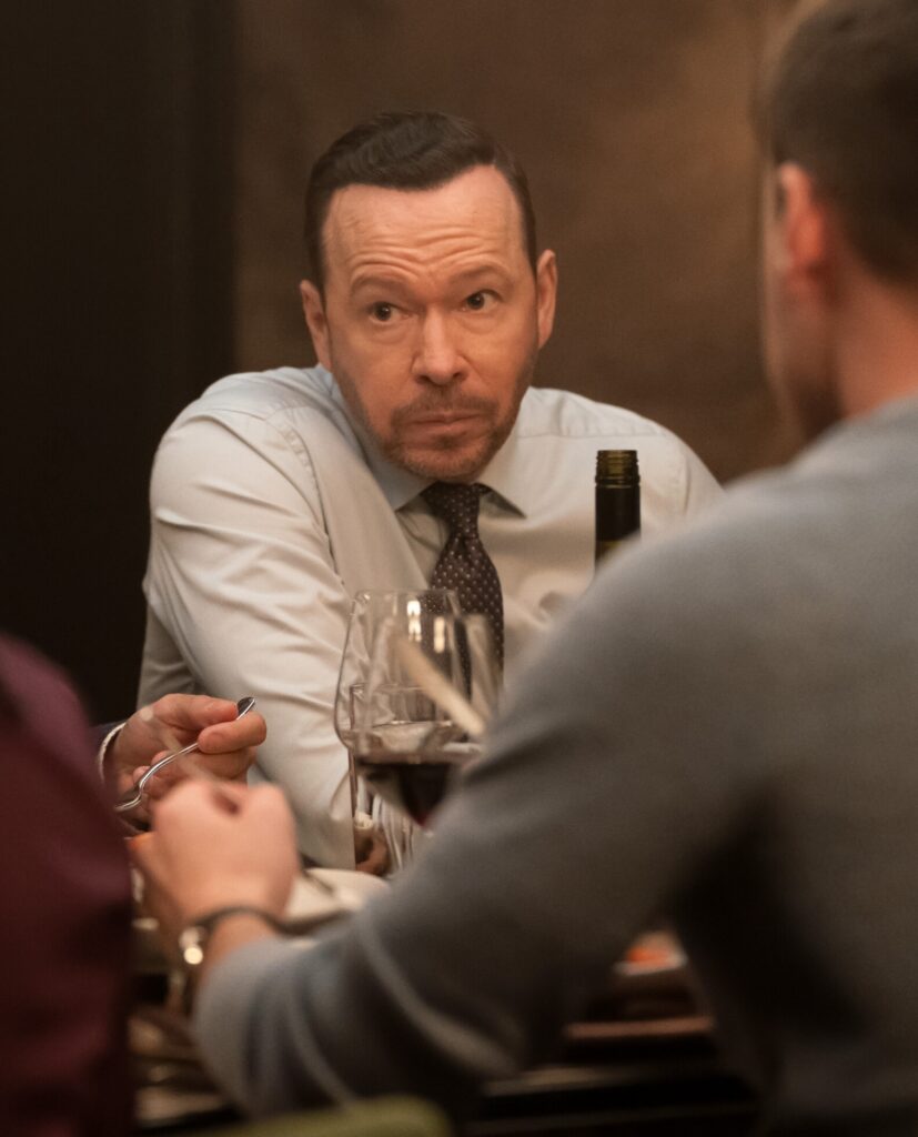 Danny sits across from Sean looking somber on Boston Blue Season 1 Episode 8