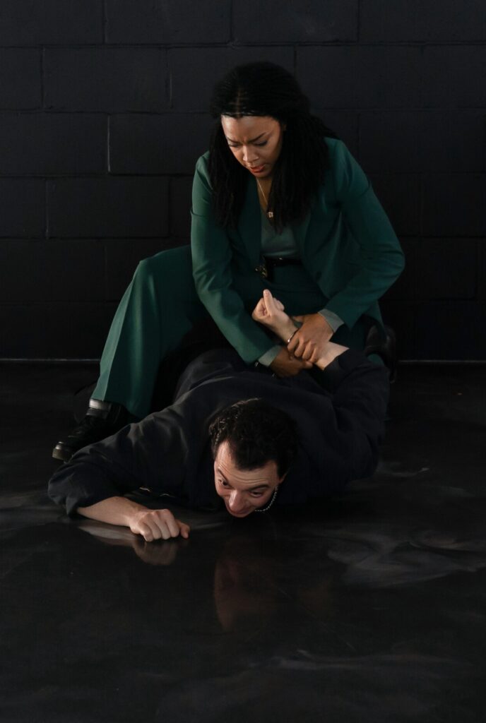 LEna throws a suspect to the ground and arrests him on Boston Blue Season 1 Episode 8