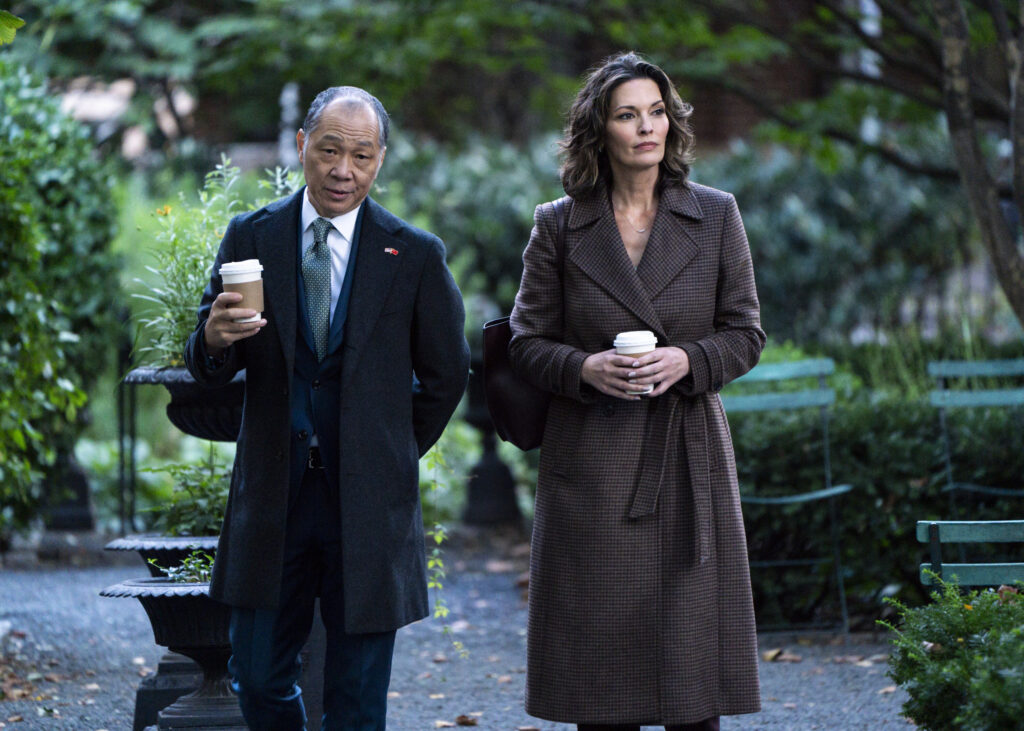 Isobel walking with a Chinese contact on FBI Season 8 Episode 8