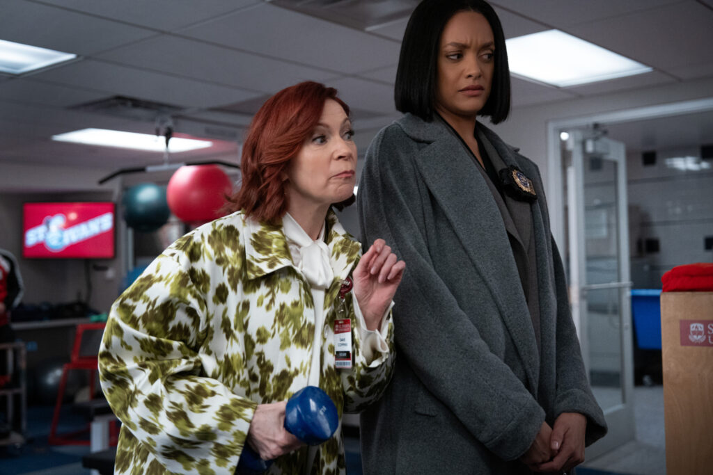 Taylor standing next to Elsbeth looking skeptical on Elsbeth Season 3 Episode 8