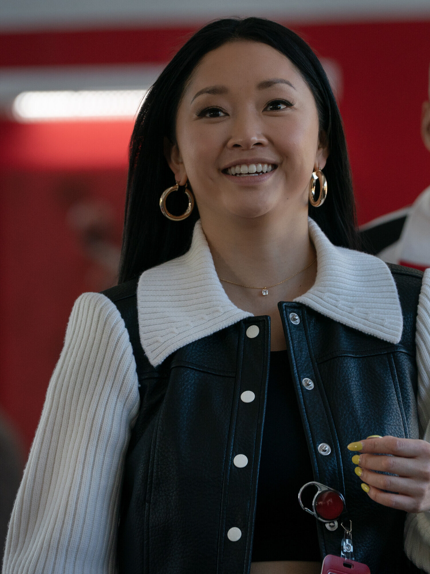 Peyton smiling while everyone else looks annoyed on Elsbeth Season 3 Episode 8