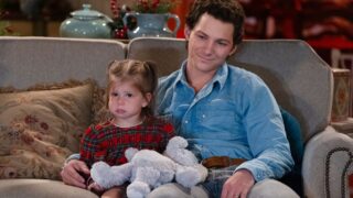 Georgie sitting with his daughter on Georgie & Mandy's First Marriage Season 2's Midseason Finale
