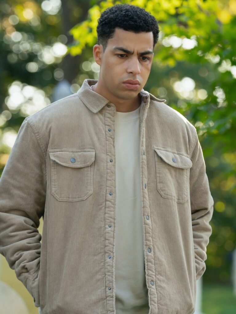 Jonah and Edwin pay their respects at Ben's grave on Boston Blue Season 1 Episode 9