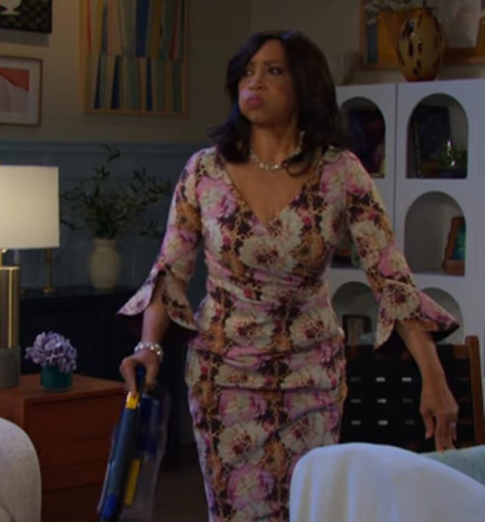 Paulina looking concerned while running the vacuum on Days of Our Lives during the week of 12-08-25