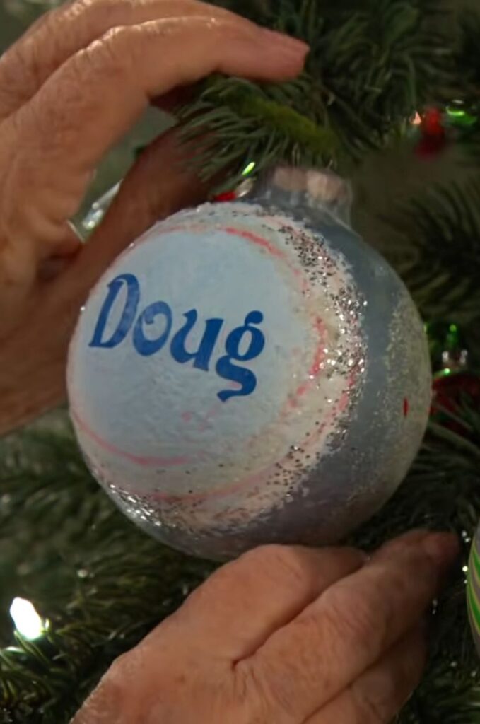 Julie hangs Doug's ornament on Days of Our Lives during the week of 12-22-25