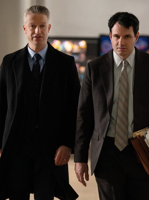 Carisi and another attorney walking together on Law & Order: SVU Season 27 Episode 12