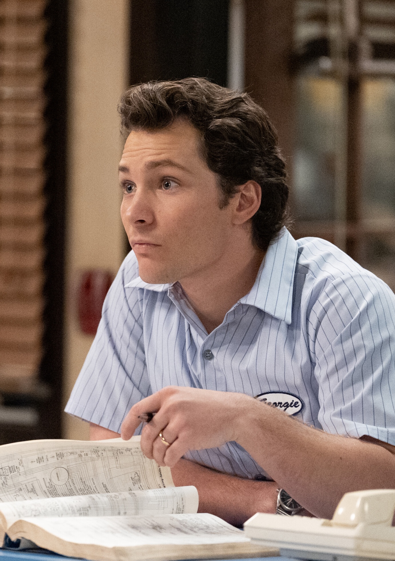 Georgie looks up from a book on Georgie & Mandy's First Marriage Season 2 Episode 11