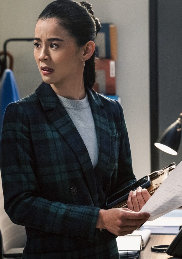 Sarah looking over her shoulder on Matlock Season 2 Episode 9