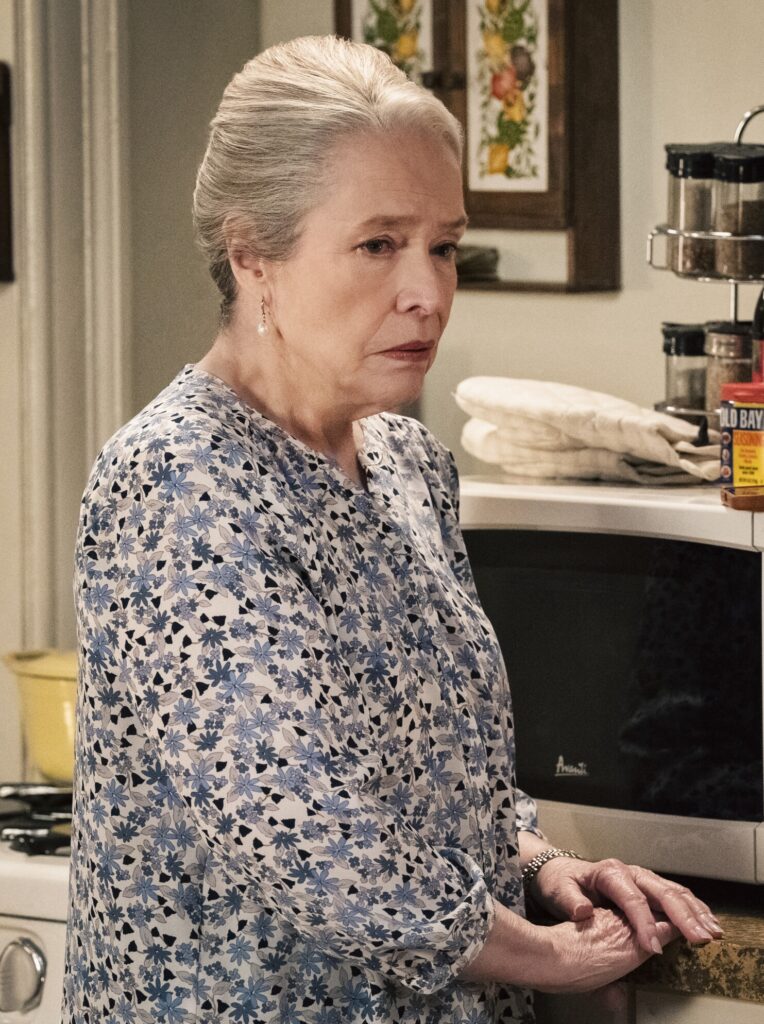 Matty standing by her kitchen on Matlock Season 2 Episode 9