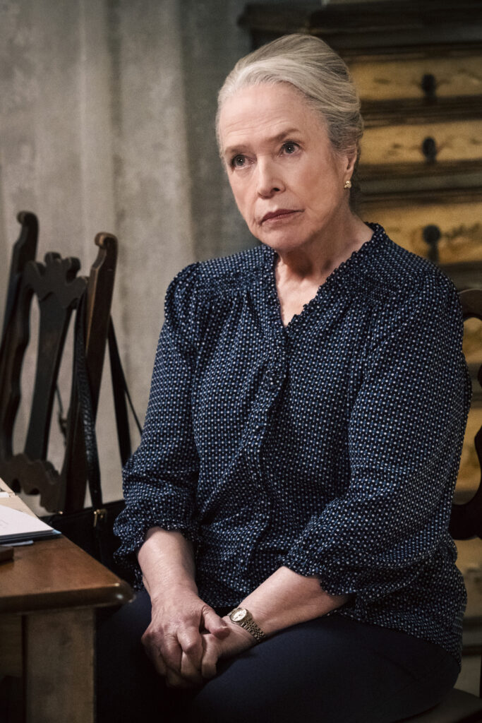 Matty sitting at the table on Matlock Season 2 Episode 9