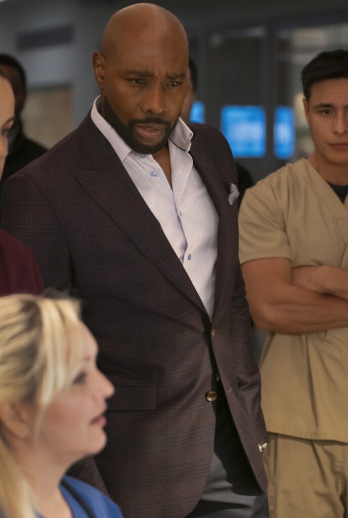 Watson studies a report on Watson Season 2 Episode 11