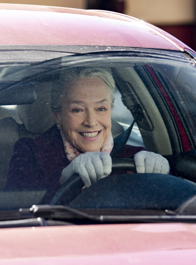 Maddy enjoying a new car on Matlock Season 2 Episode 11